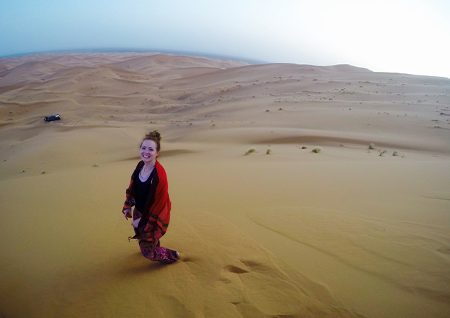 Sahara Desert: having some fun running around the Sand Dunes before camping in the Sahara Desert in Morocco